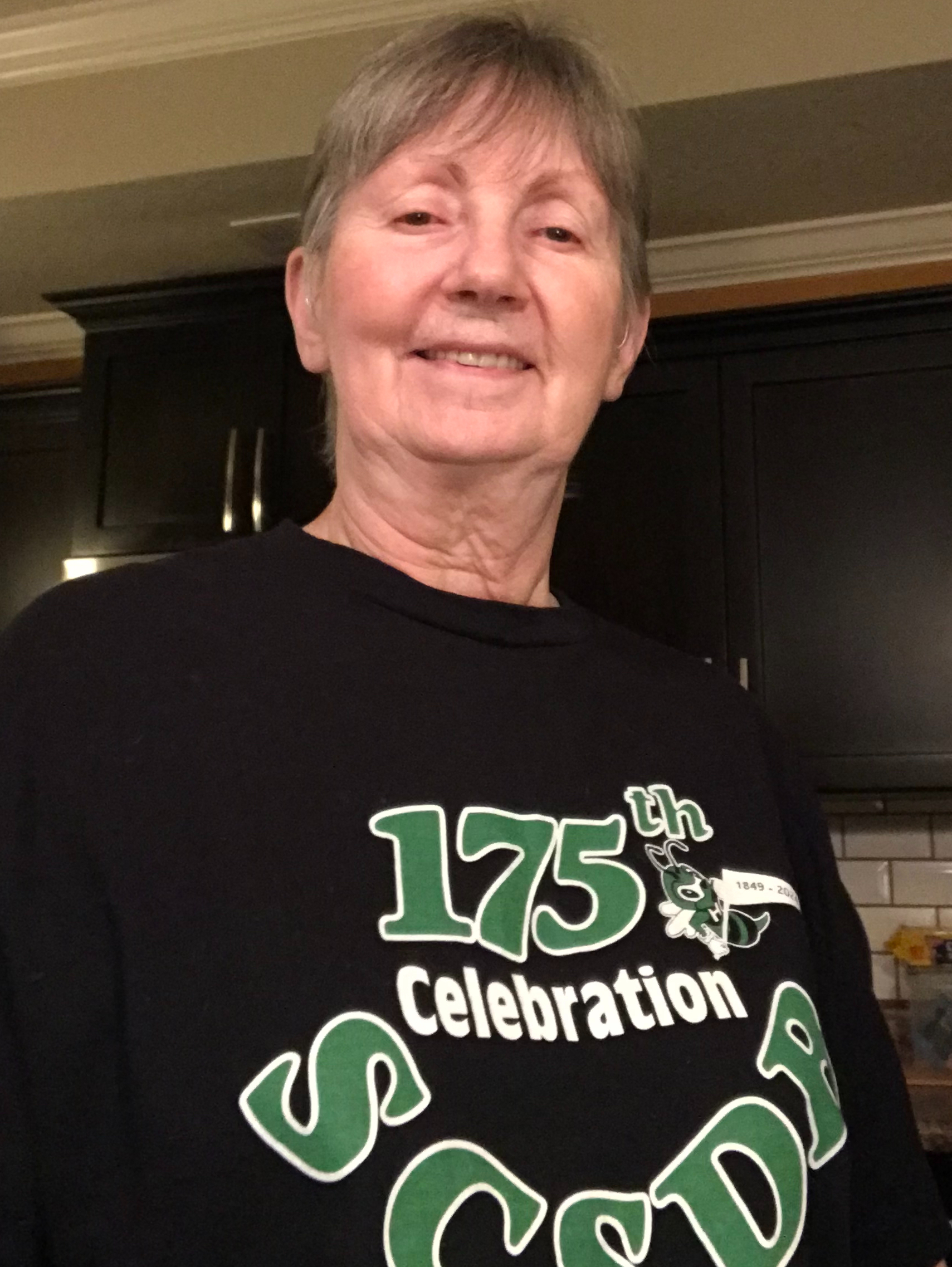 Judy Riddle wearing a black 175th celebration SCSDB shirt
